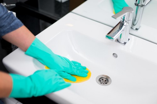 Professional upholstery cleaning equipment on a sofa